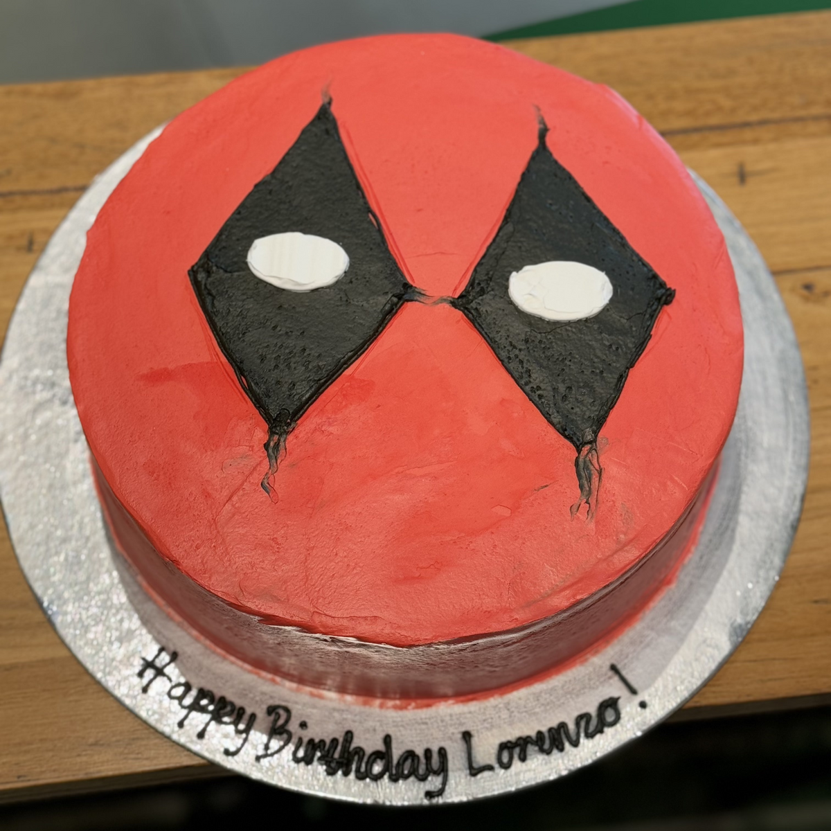 top view of a handcrafted Deadpool-themed ice cream cake made using Ben & Jerry's ice cream in Adelaide, highlighting its bold birthday design.