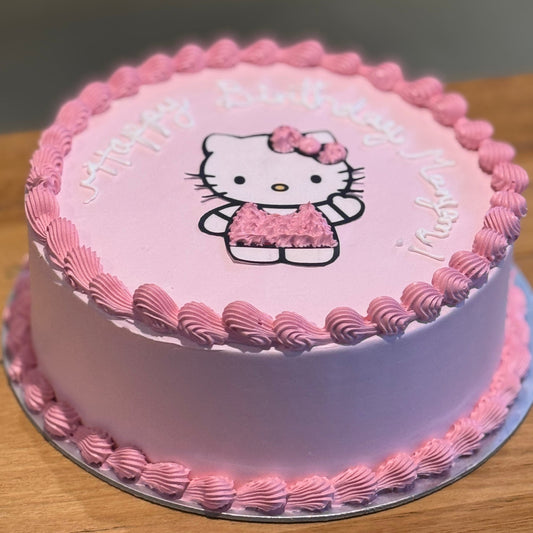 Front view of a Hello Kitty-themed birthday cake made with Ben & Jerry's ice cream in Adelaide, showcasing its recognisable Sanrio character styling.
