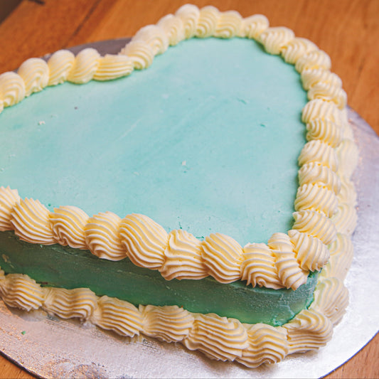 top view of a heart-shaped birthday cake made with Ben & Jerry's ice cream in Adelaide, showcasing its clean, understated styling.