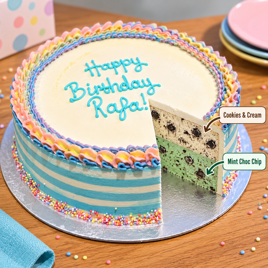 front view of Striped Rainbow ice cream Cake with two ben & jerry's ice cream flavour inside