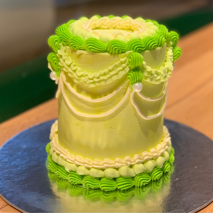 Two tier birthday ice cream cakes in Adelaide featuring stacked celebration designs handcrafted with Ben & Jerry's ice cream