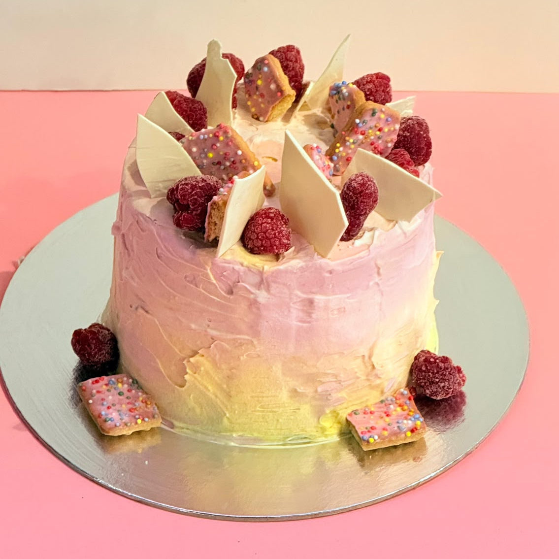 Full view of the Berry Fairy Pastel Picnic Ice Cream Cake handcrafted in Adelaide with Ben & Jerry’s ice cream and whimsical pastel decorations.