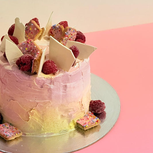 side view of the Berry Fairy Ice Cream Cake featuring dreamy pastel colours and charming berry, fairy, and picnic-inspired birthday details.