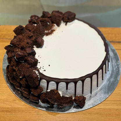 top view of a handcrafted brownie ice cream cake in Adelaide made using Ben & Jerry's ice cream, highlighting its rich brownie decorations.