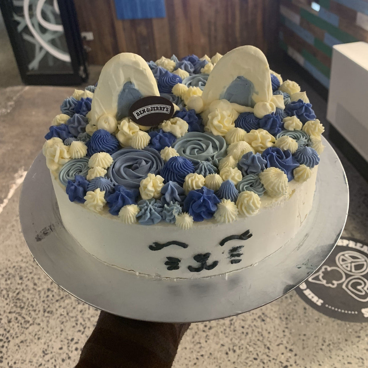 Full view of a cute cat-themed birthday cake, Design #2, handcrafted in Adelaide using Ben & Jerry's ice cream for a feline-inspired celebration.