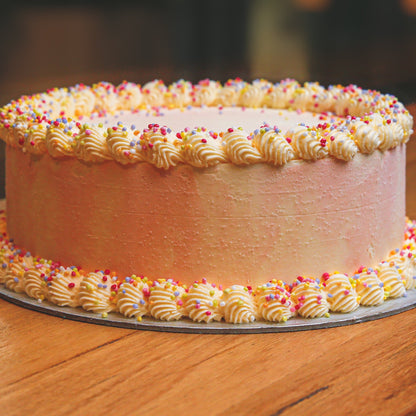front view of a handcrafted Celebrations Cake Design #4 featuring festive birthday decorations, made with Ben & Jerry's ice cream in Adelaide.