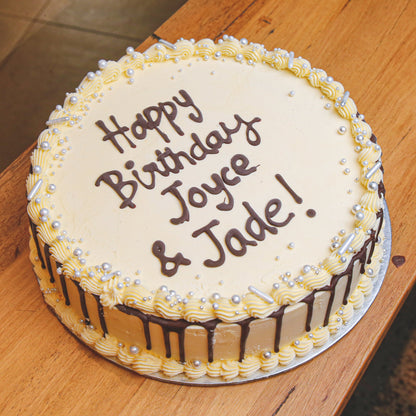 Full view of Celebrations Cake Design 2, a handcrafted birthday ice cream cake featuring festive celebration-themed styling.