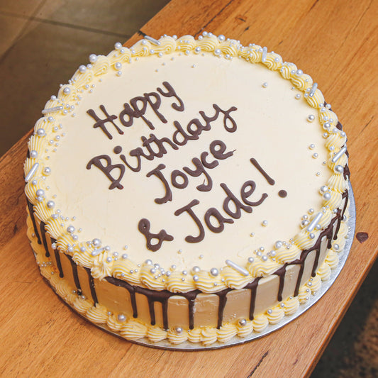 Full view of Celebrations Cake Design 2, a handcrafted birthday ice cream cake featuring festive celebration-themed styling.