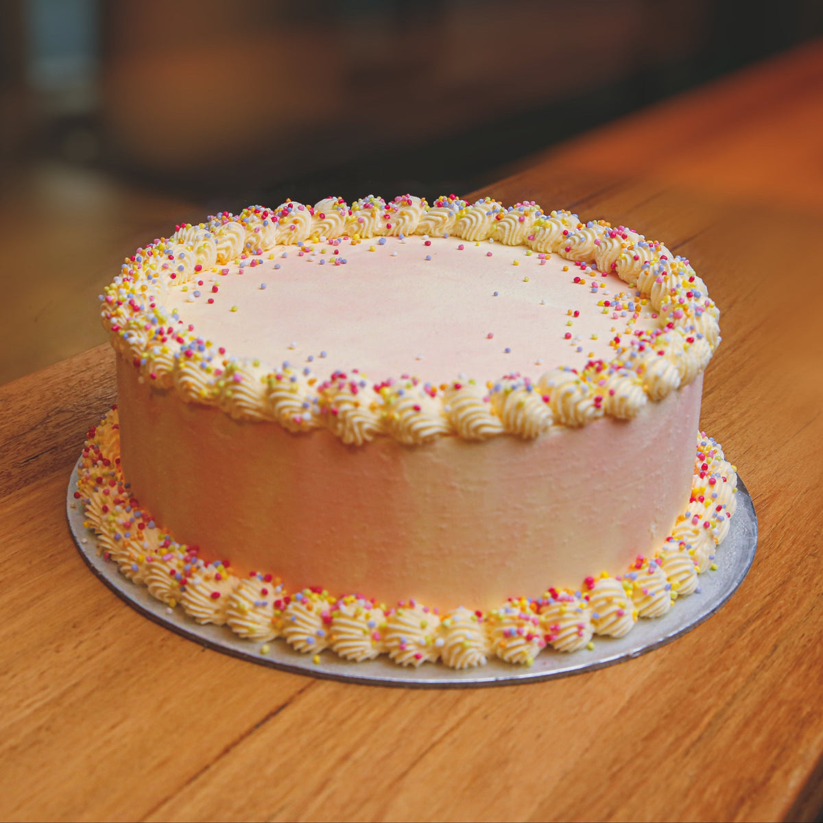 Front view of Celebrations Cake Design #4 made with Ben & Jerry's ice cream in Adelaide, showcasing its party-inspired styling.