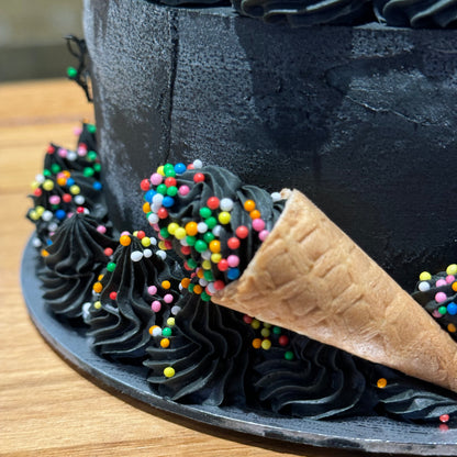 Close-up of the dark decorative finish on Celebrations Cake Design #6, handcrafted in Adelaide using Ben & Jerry's ice cream.
