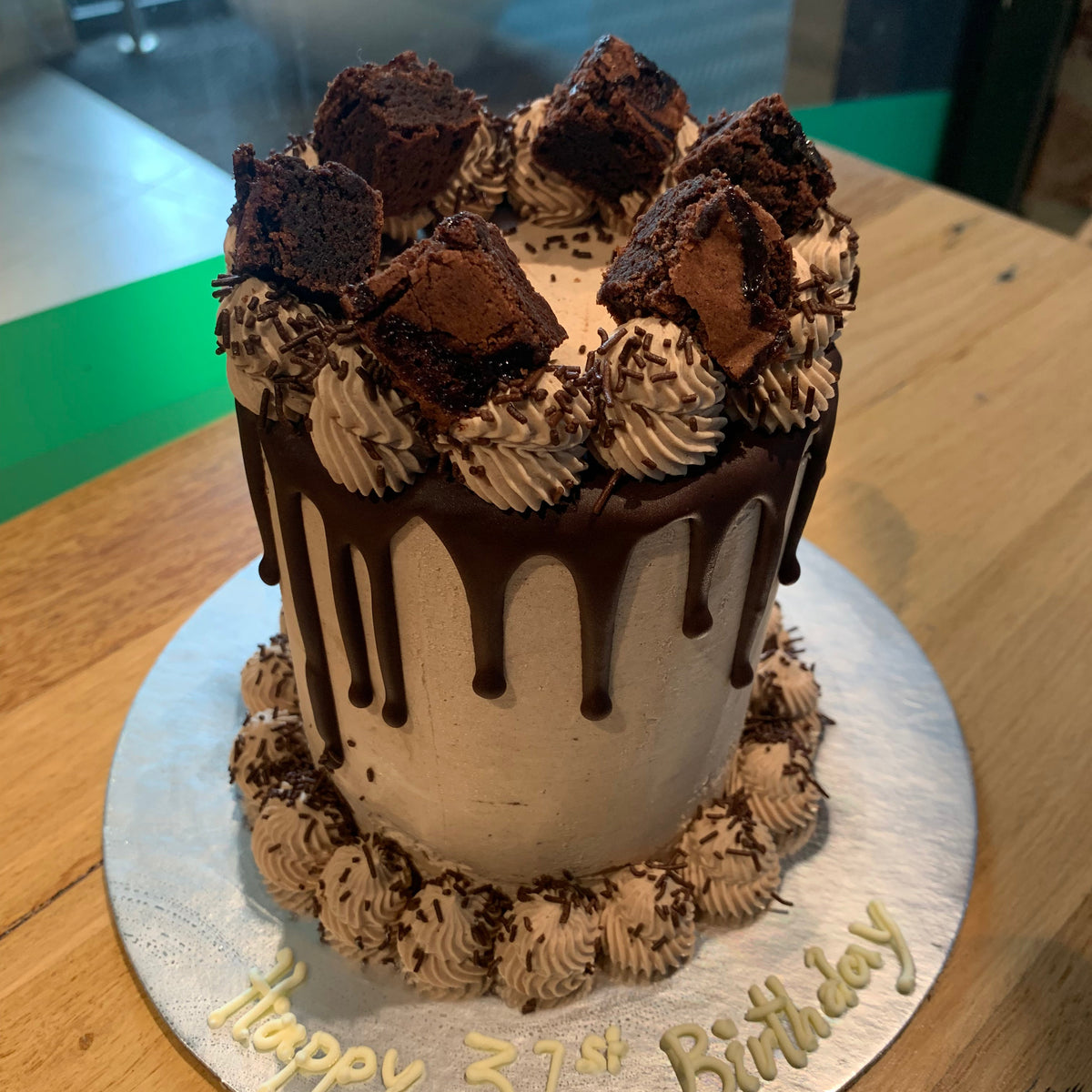 top view of a tall chocolate fudge brownie birthday cake made with Ben & Jerry's ice cream in Adelaide, showcasing its rich dessert-inspired presentation.