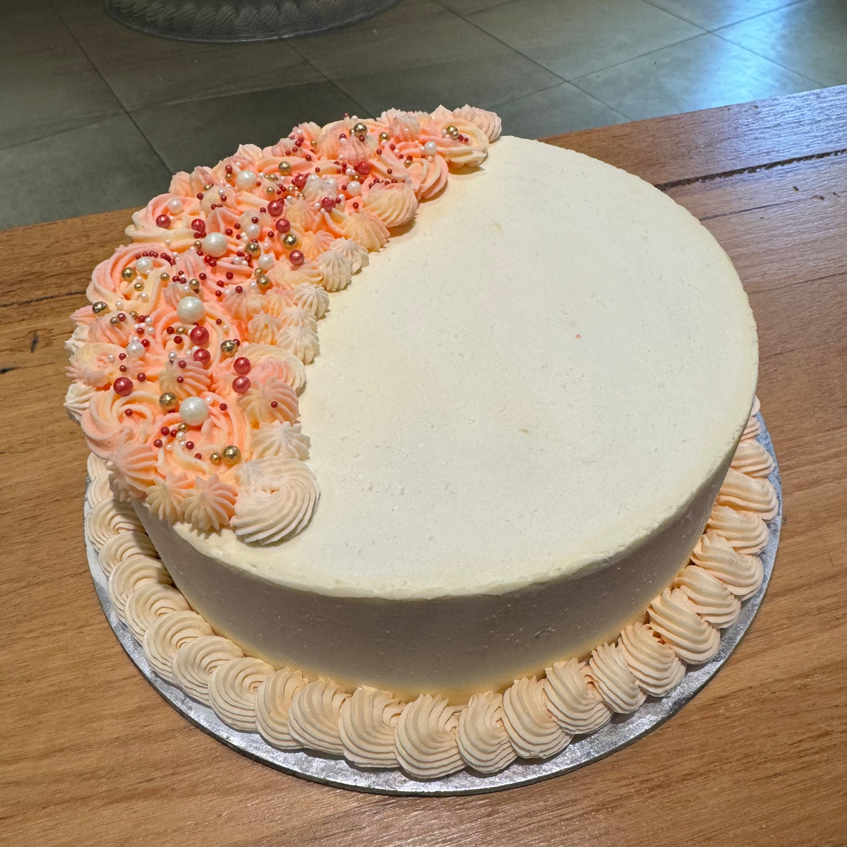 Full view of a crescent moon-shaped cake handcrafted in Adelaide using Ben & Jerry's ice cream, featuring an elegant celestial-inspired design.