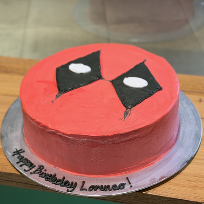 side view of a Deadpool birthday cake made with Ben & Jerry's ice cream in Adelaide, showcasing its recognisable superhero-inspired theme.
