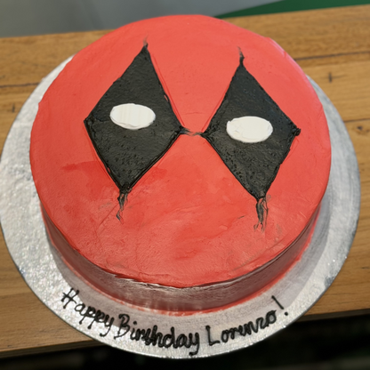 top view of a handcrafted Deadpool-themed ice cream cake made using Ben & Jerry's ice cream in Adelaide, highlighting its bold birthday design.