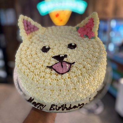 top view of a cute doggo birthday cake made with Ben & Jerry's ice cream in Adelaide, showcasing its playful canine-inspired design.