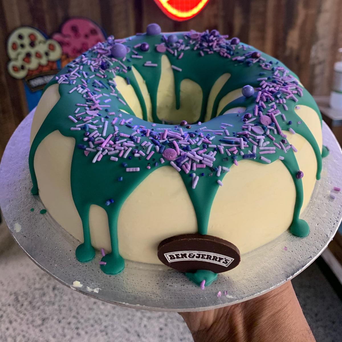 front view of a handcrafted donut ice cream cake made with Ben & Jerry's ice cream in Adelaide, highlighting its dessert-inspired shape.