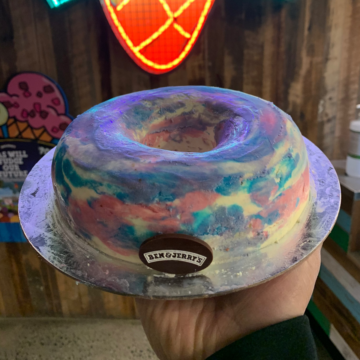 front view of a handcrafted donut ice cream cake made with Ben & Jerry's ice cream in Adelaide, highlighting its dessert-inspired shape.