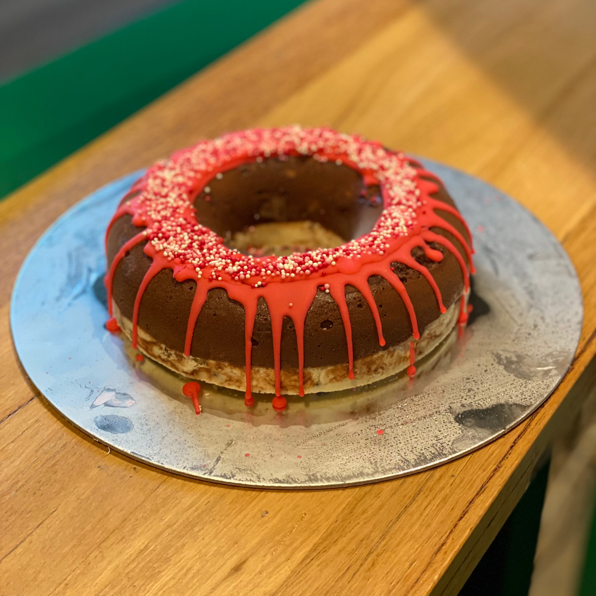 front view of a donut-shaped birthday cake made with Ben & Jerry's ice cream in Adelaide, showcasing its distinctive ring-shaped presentation.