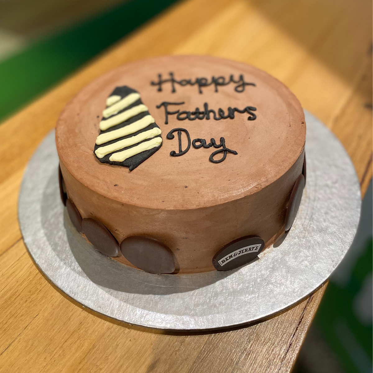 front view of a handcrafted Father's Day tie-themed ice cream cake made using Ben & Jerry's ice cream in Adelaide, ideal for celebrating hardworking dads.