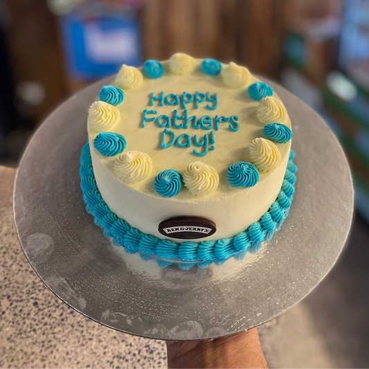Full view of a blue and white Father's Day cake handcrafted in Adelaide using Ben & Jerry's ice cream, designed for a special celebration for Dad.