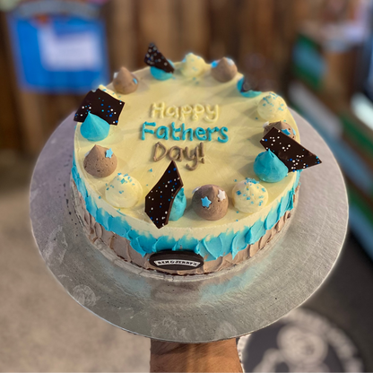 top view of a Father's Day cake made with Ben & Jerry's ice cream in Adelaide, showcasing its classic blue and white decorative styling.