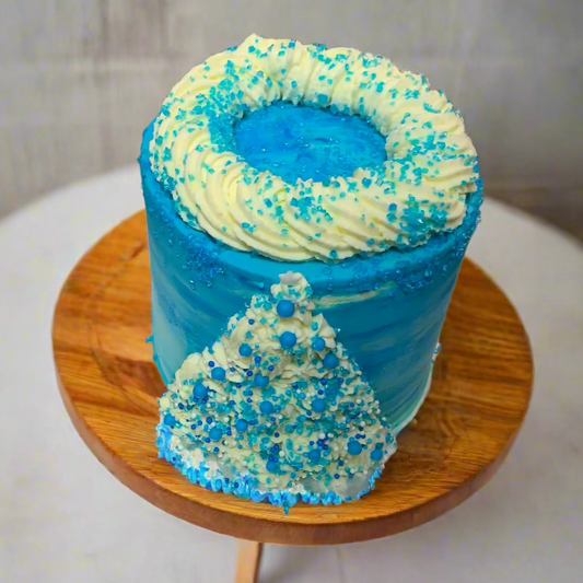 top view of a handcrafted tall Frozen Elsa ice cream cake made using Ben & Jerry's ice cream in Adelaide, highlighting its elegant height and princess theme.