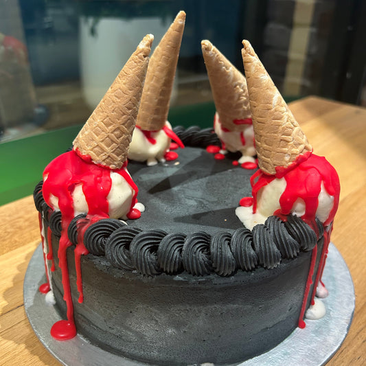 Full view of a Halloween Bloody Cones cake handcrafted in Adelaide using Ben & Jerry's ice cream, featuring creepy cone-inspired decorations.