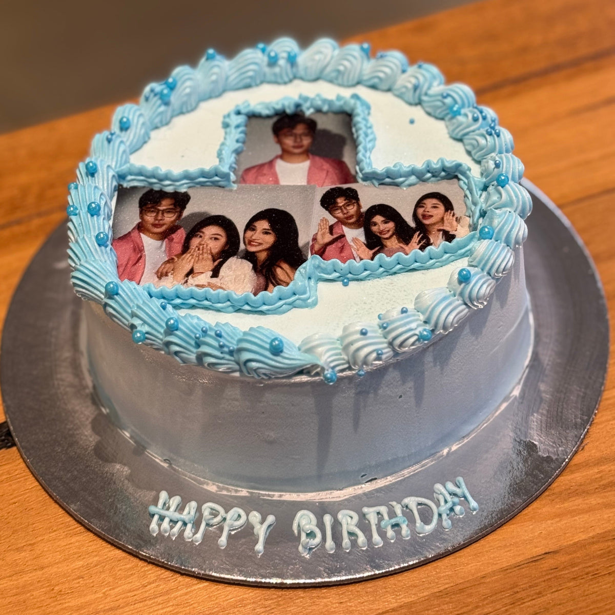 top view of a custom edible photo print on a personalised birthday cake made in Adelaide using Ben & Jerry's ice cream.