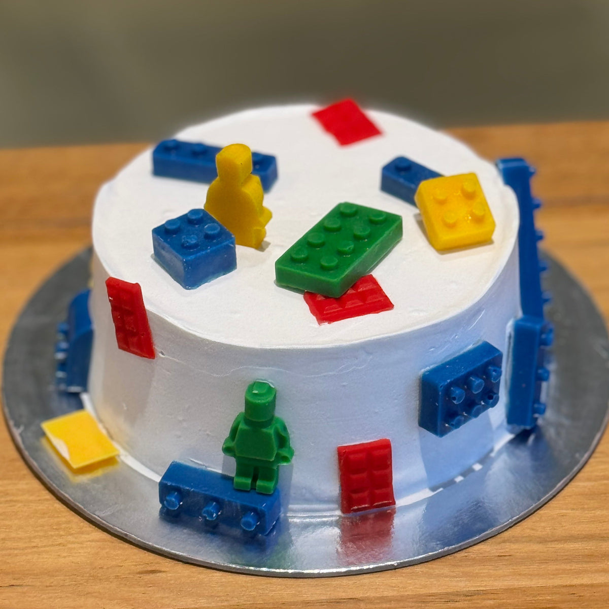 Front view of a LEGO-themed cake made with Ben & Jerry's ice cream in Adelaide, showcasing its playful building block-inspired design.