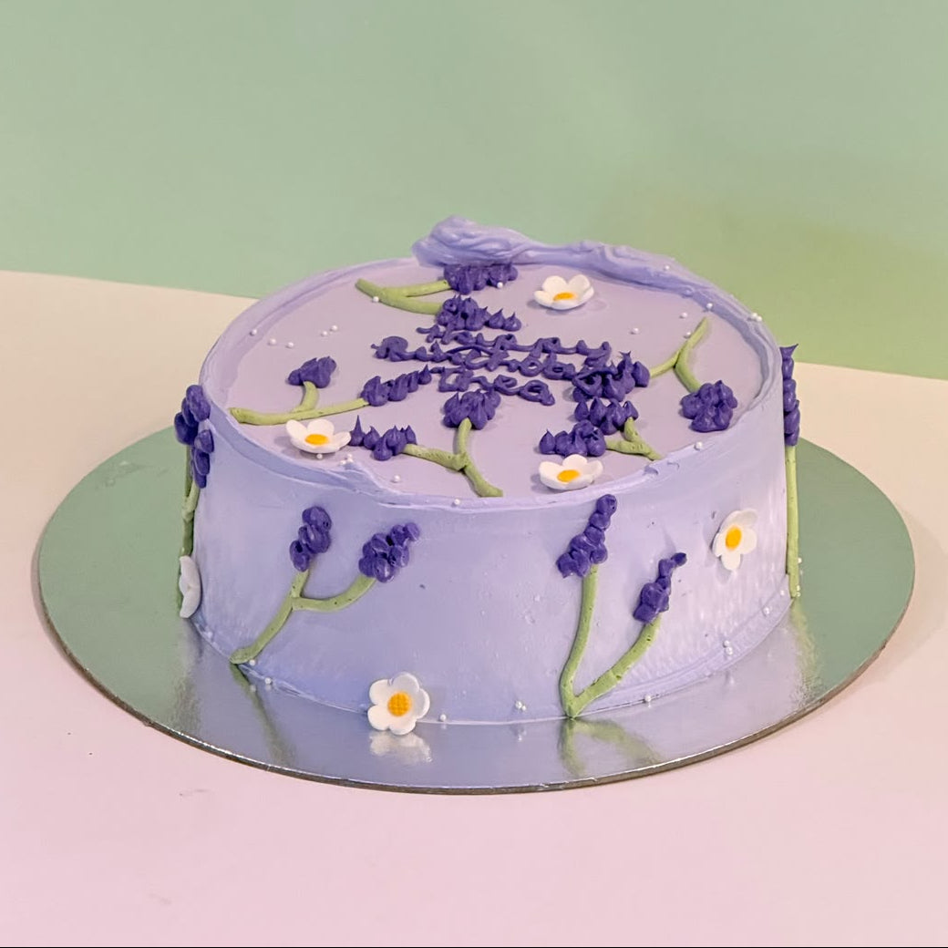 Front view of the Lavender Purple Ice Cream Cake featuring beautiful purple styling for a birthday or milestone celebration.
