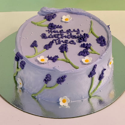 top view of the Lavender Purple Ice Cream Cake handcrafted with Ben & Jerry’s ice cream and personalised celebration details.