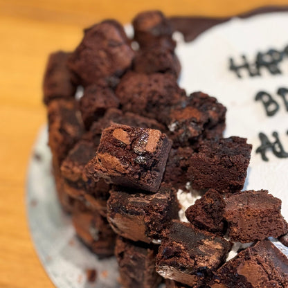 Close-up of the brownie-inspired toppings on a heart-shaped cake made in Adelaide using Ben & Jerry's ice cream.