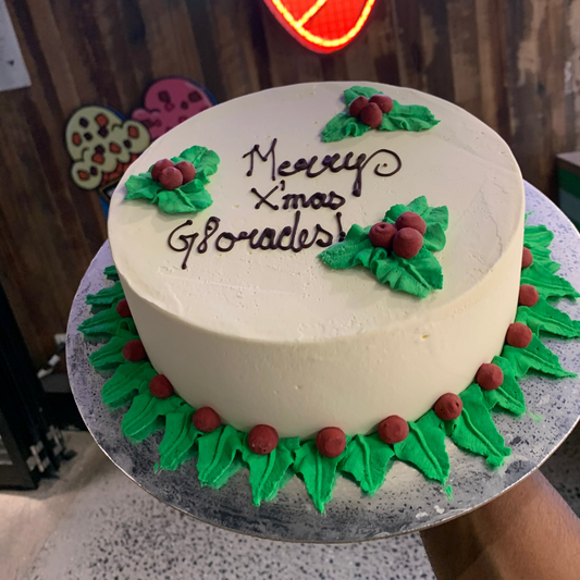 Front view of a mistletoe-inspired Christmas cake made with Ben & Jerry's ice cream in Adelaide, designed for festive family celebrations.