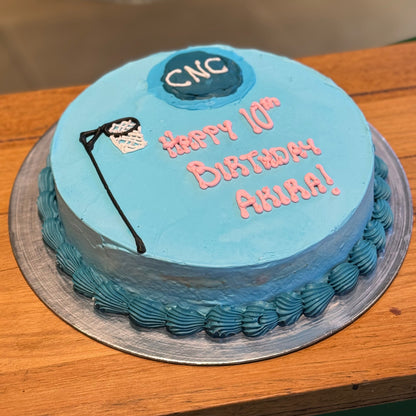 Full view of a netball-themed birthday cake handcrafted in Adelaide using Ben & Jerry's ice cream, featuring sporty celebration decorations.