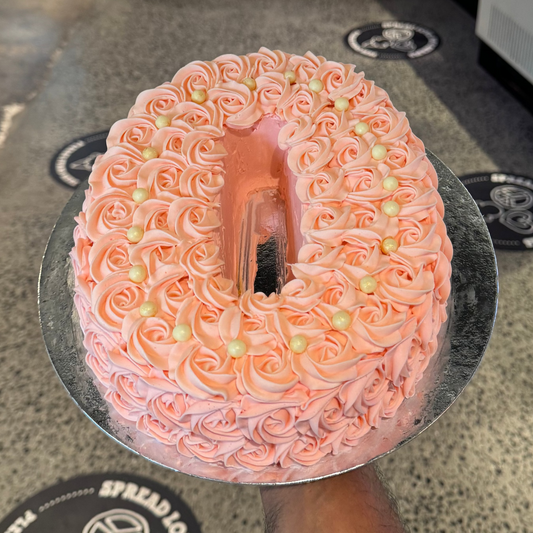 top view of a number 0-shaped birthday cake handcrafted in Adelaide using Ben & Jerry's ice cream, ideal for milestone celebrations.