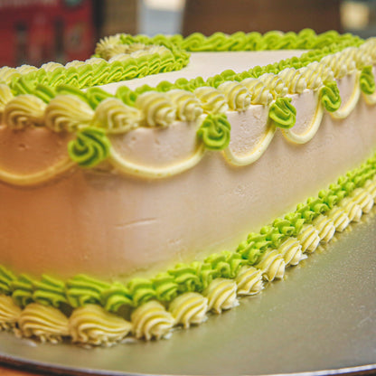 Close-up view of the decorative details on a number 1-shaped birthday ice cream cake for a first birthday celebration.