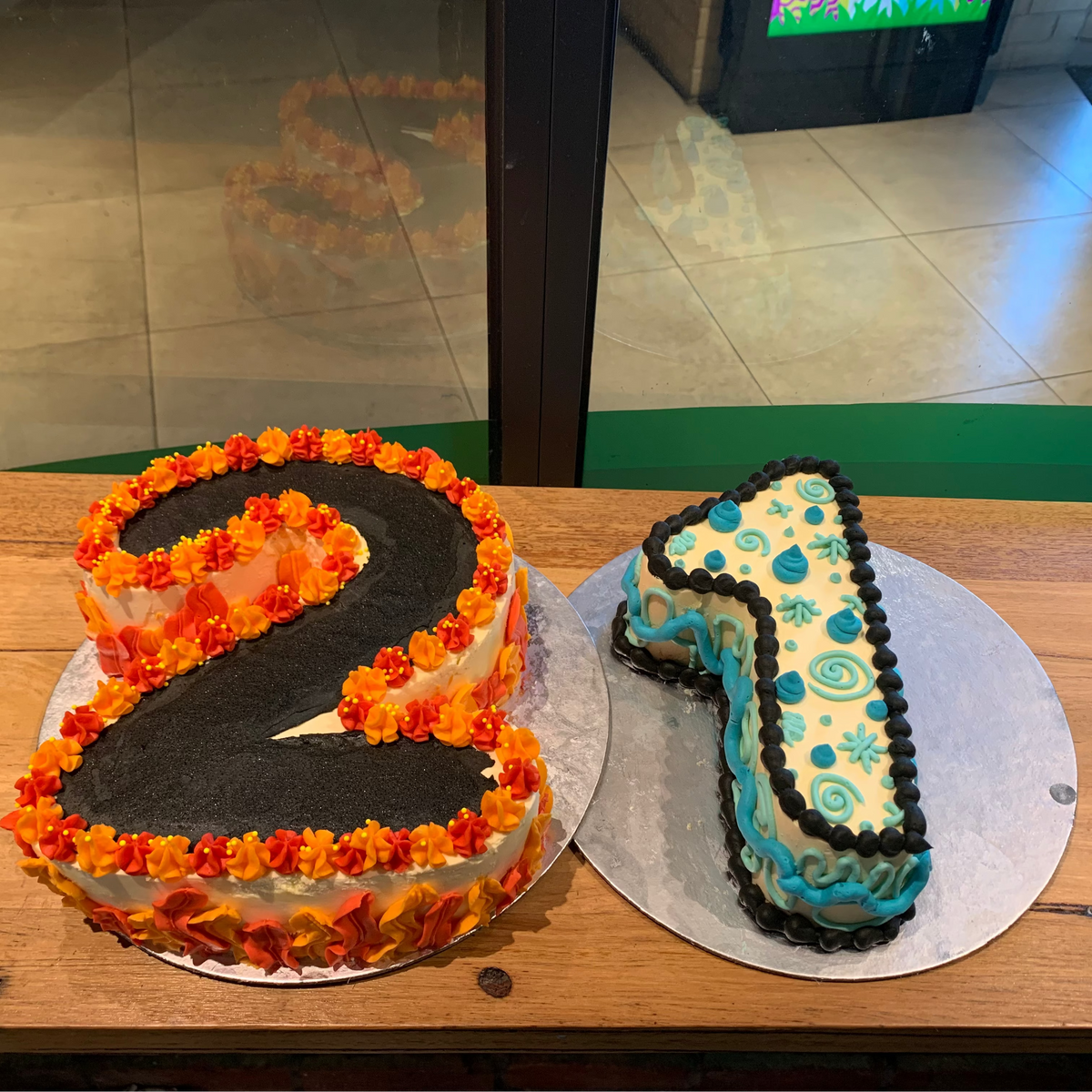 Full view of a number 2-shaped birthday cake handcrafted in Adelaide using Ben & Jerry's ice cream, designed for a second birthday celebration.