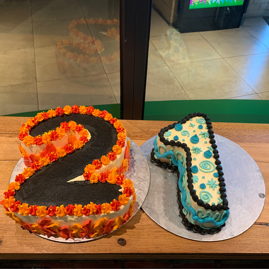 Full view of a number 2-shaped birthday cake handcrafted in Adelaide using Ben & Jerry's ice cream, designed for a second birthday celebration.