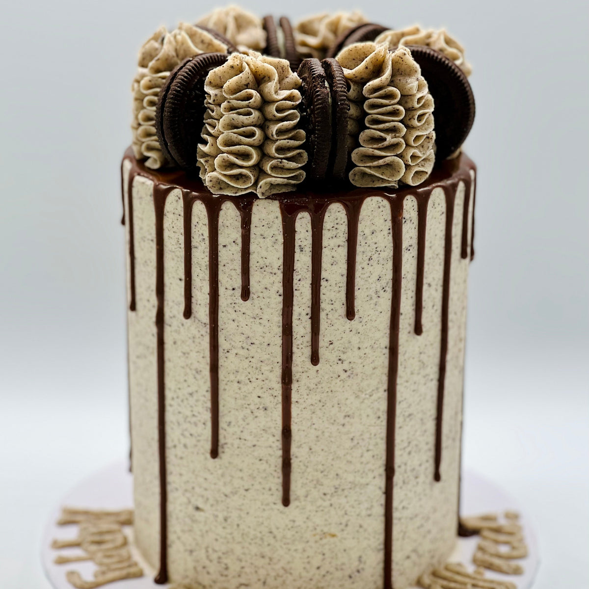 front view of a handcrafted Oreo mud or sponge cake in Adelaide, highlighting its decorative cookie-themed finish.