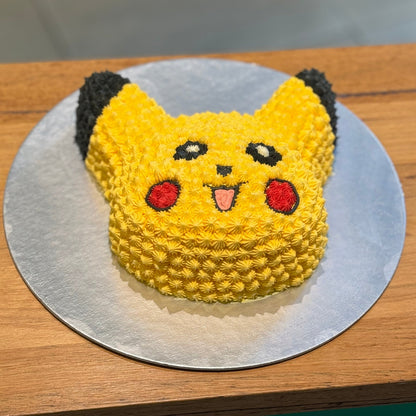 Full view of a Pikachu-shaped Pokémon birthday cake handcrafted in Adelaide using Ben & Jerry's ice cream, featuring the character's signature yellow design.