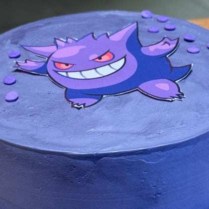Close-up of Gengar-inspired decorative details on a Pokémon birthday cake made in Adelaide using Ben & Jerry's ice cream.