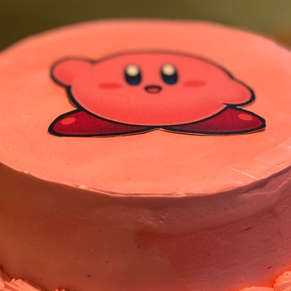 close up of a Kirby-themed birthday cake made with Ben & Jerry's ice cream in Adelaide, showcasing its cheerful pink character styling.