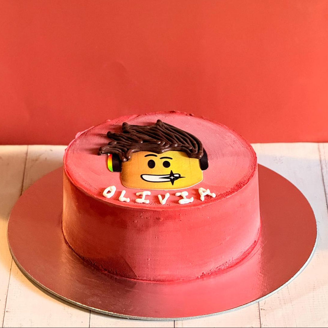 front view of a handcrafted Roblox avatar ice cream cake highlighting its gaming-themed design and decorative finish.