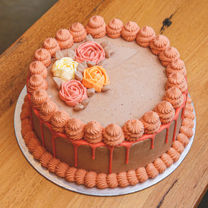 Full view of a rose-themed birthday ice cream cake featuring elegant floral decorations for romantic celebrations and special occasions.