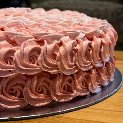 Side view of a handcrafted rosette ice cream cake made using Ben & Jerry's ice cream in Adelaide, highlighting its textured floral-inspired finish.