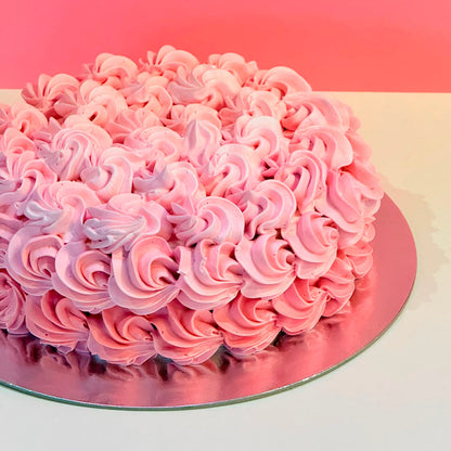 side of the intricate rosette-inspired piping on a birthday cake handcrafted in Adelaide using Ben & Jerry's ice cream.