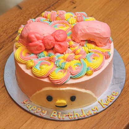 top view of a Sanrio My Melody birthday ice cream cake featuring the adorable pink-hooded character in a kawaii-inspired design.