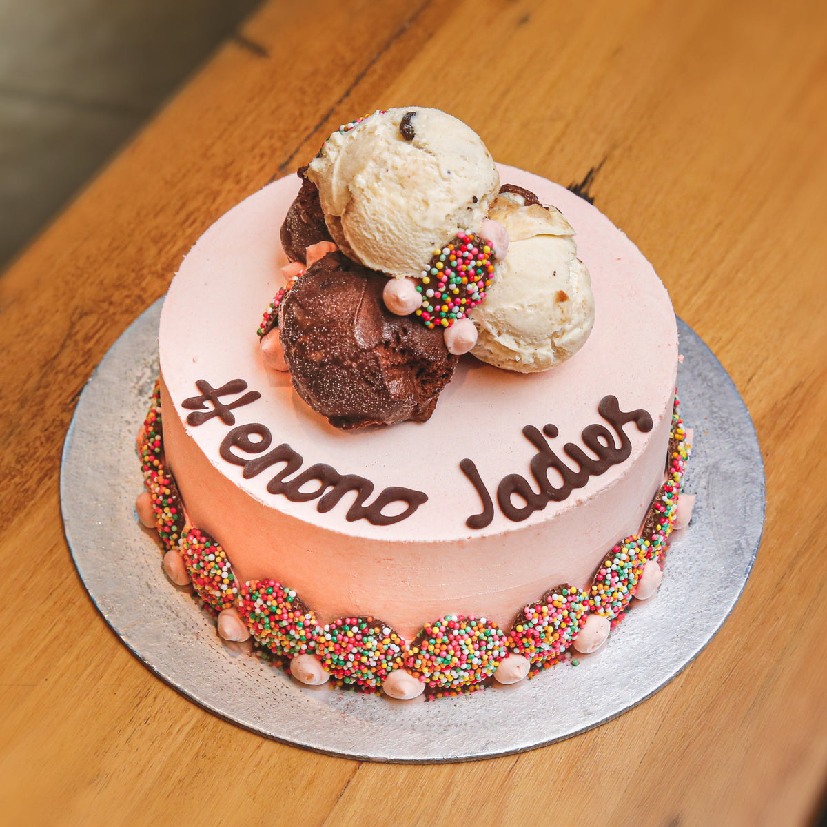 Full view of a Stacks On birthday ice cream cake featuring stacked chocolate treats and a loaded dessert-style design for celebrations.