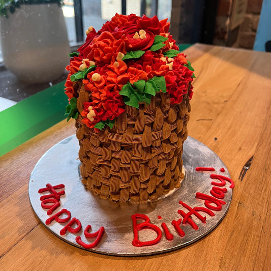 Full view of a tall basket of roses cake handcrafted in Adelaide using Ben & Jerry's ice cream, featuring elegant floral-inspired decorations.
