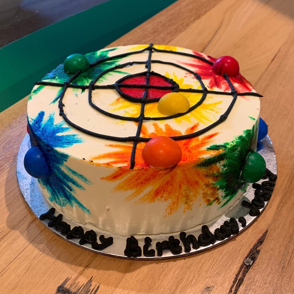 Front view of a target practice birthday cake made with Ben & Jerry's ice cream in Adelaide, showcasing its Nerf party-inspired decoration.